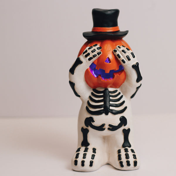 A Cheerful Giver Hiding Pumpkin Ghost