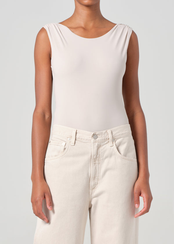 a gold e Ara Bodysuit Buff