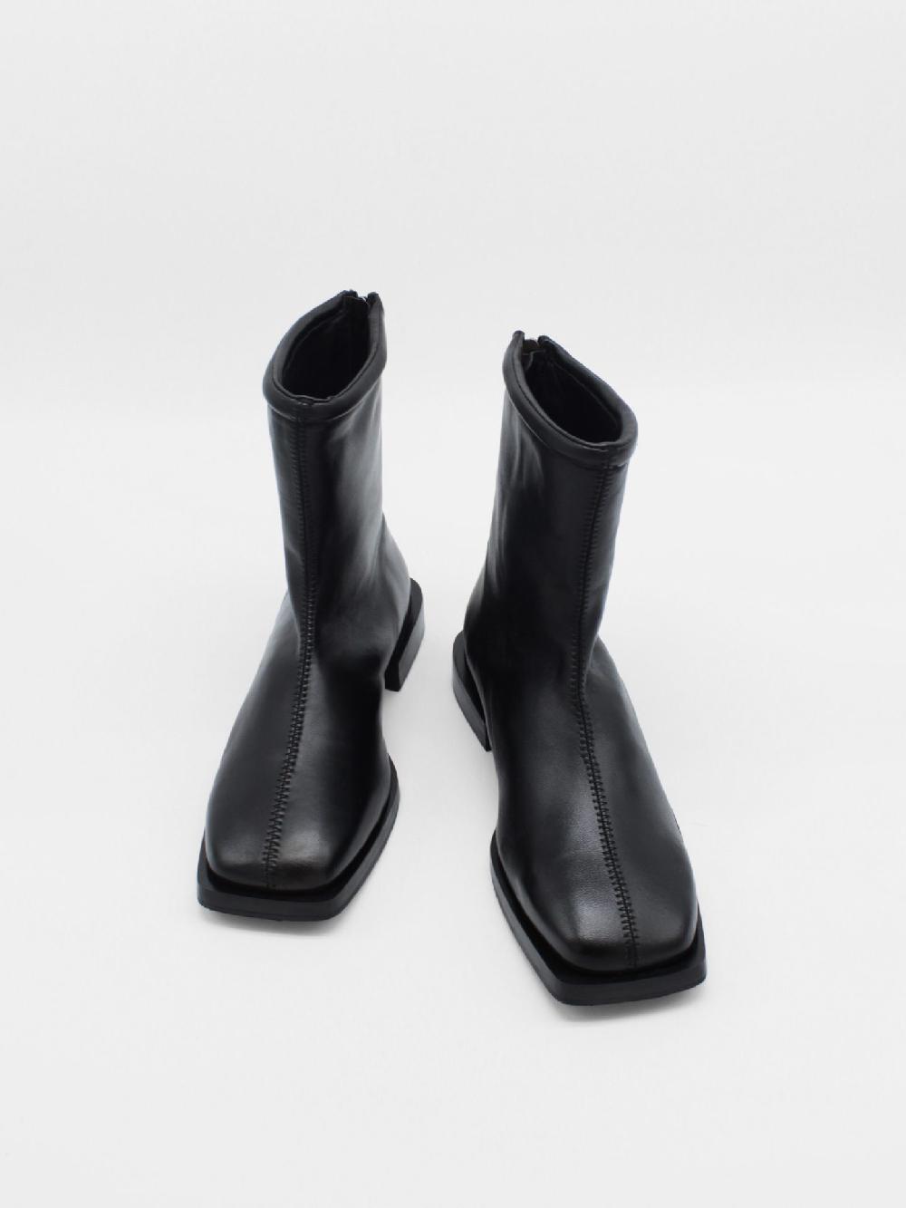 About Arianne Dean Black Boots