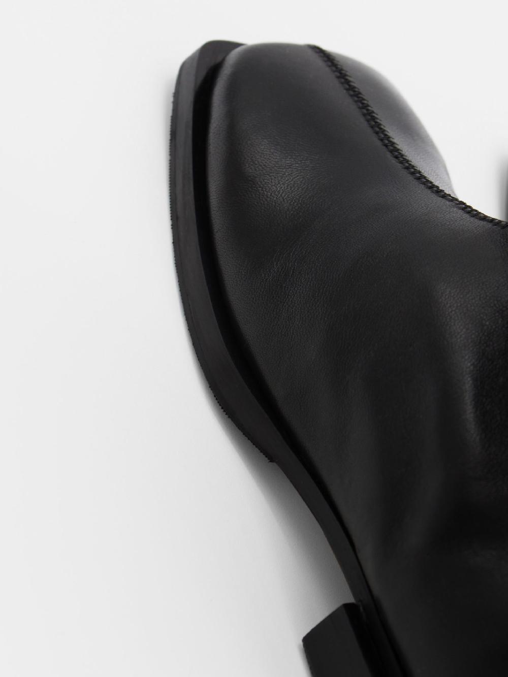 About Arianne Dean Black Boots