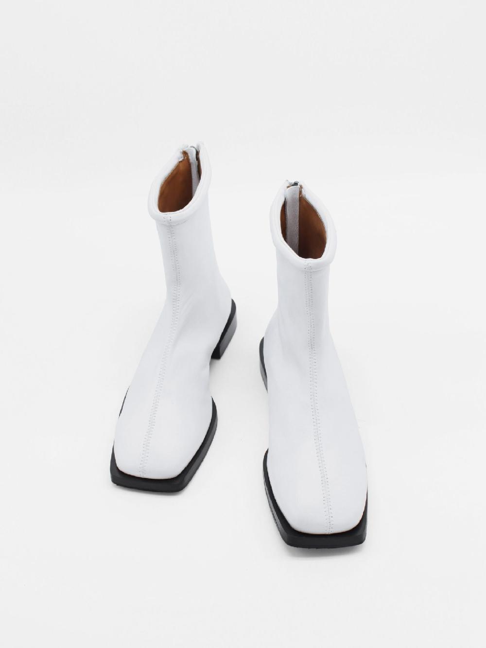 About Arianne Dean White Boots