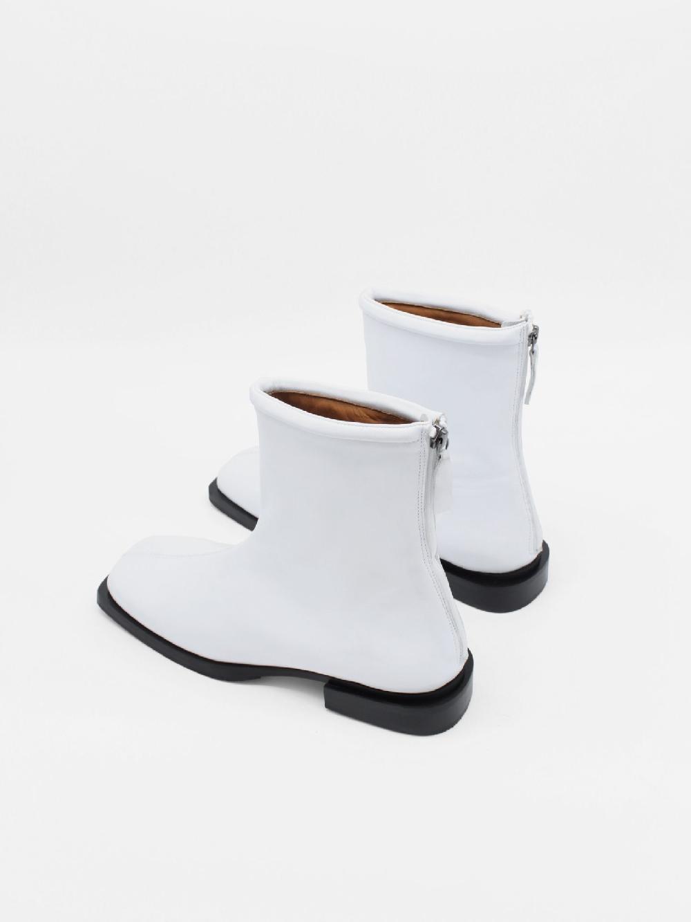 About Arianne Dean White Boots