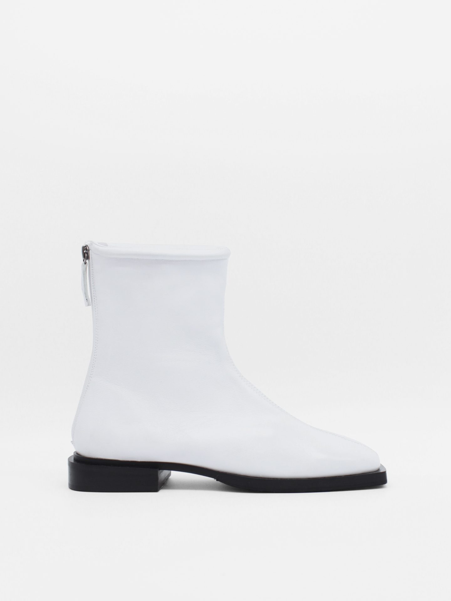 about arianne Dean White Boots