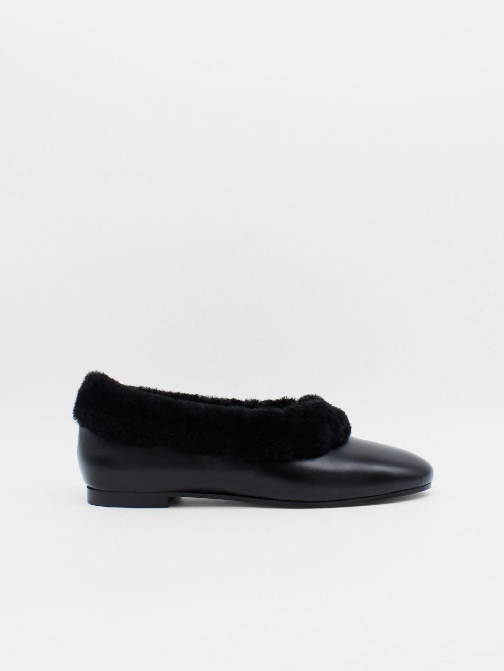 About Arianne Elias Black Flats