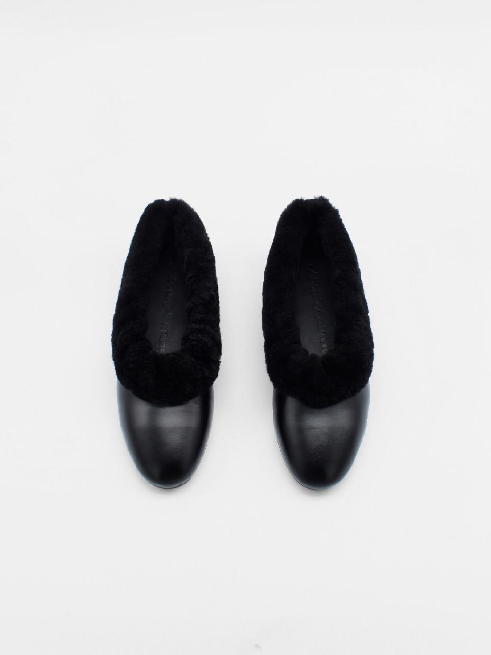 About Arianne Elias Black Flats