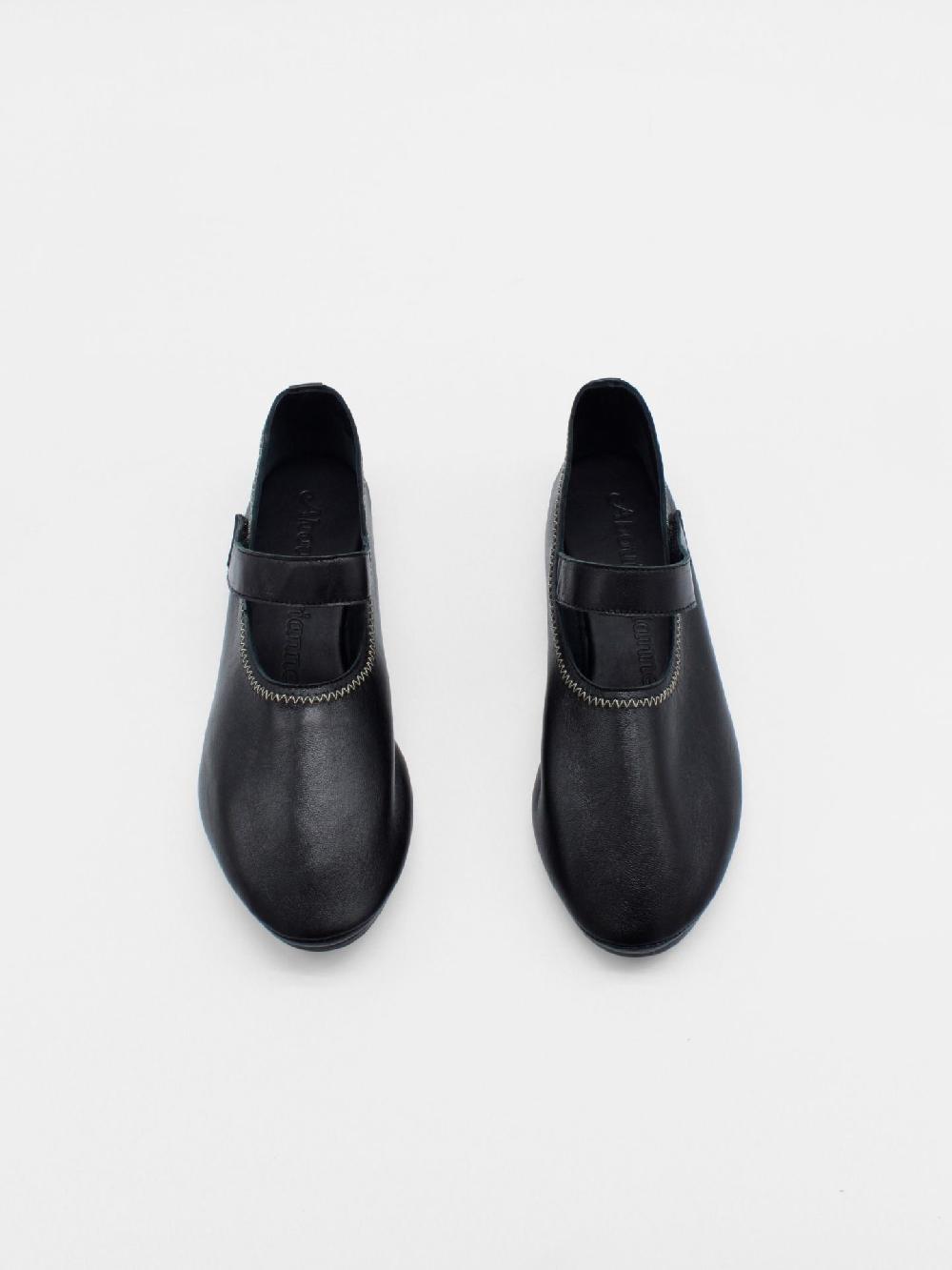 About Arianne Martino Black Flats