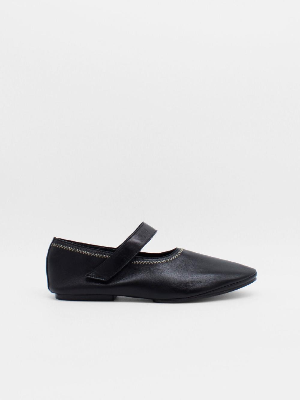 about arianne Martino Black Flats