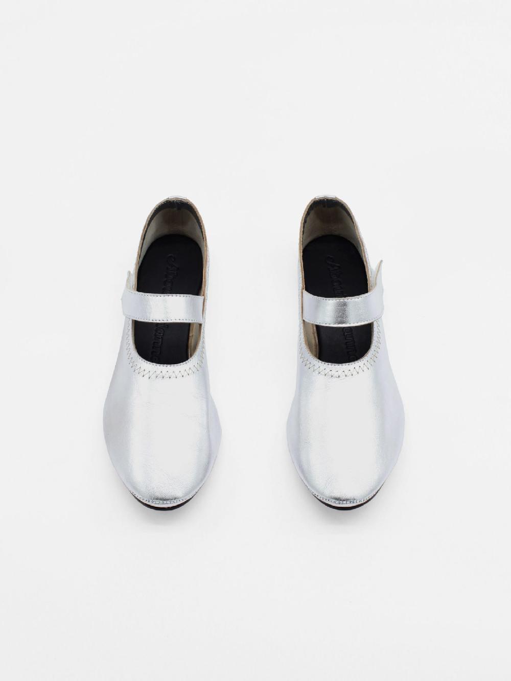 About Arianne Martino Scale Flats