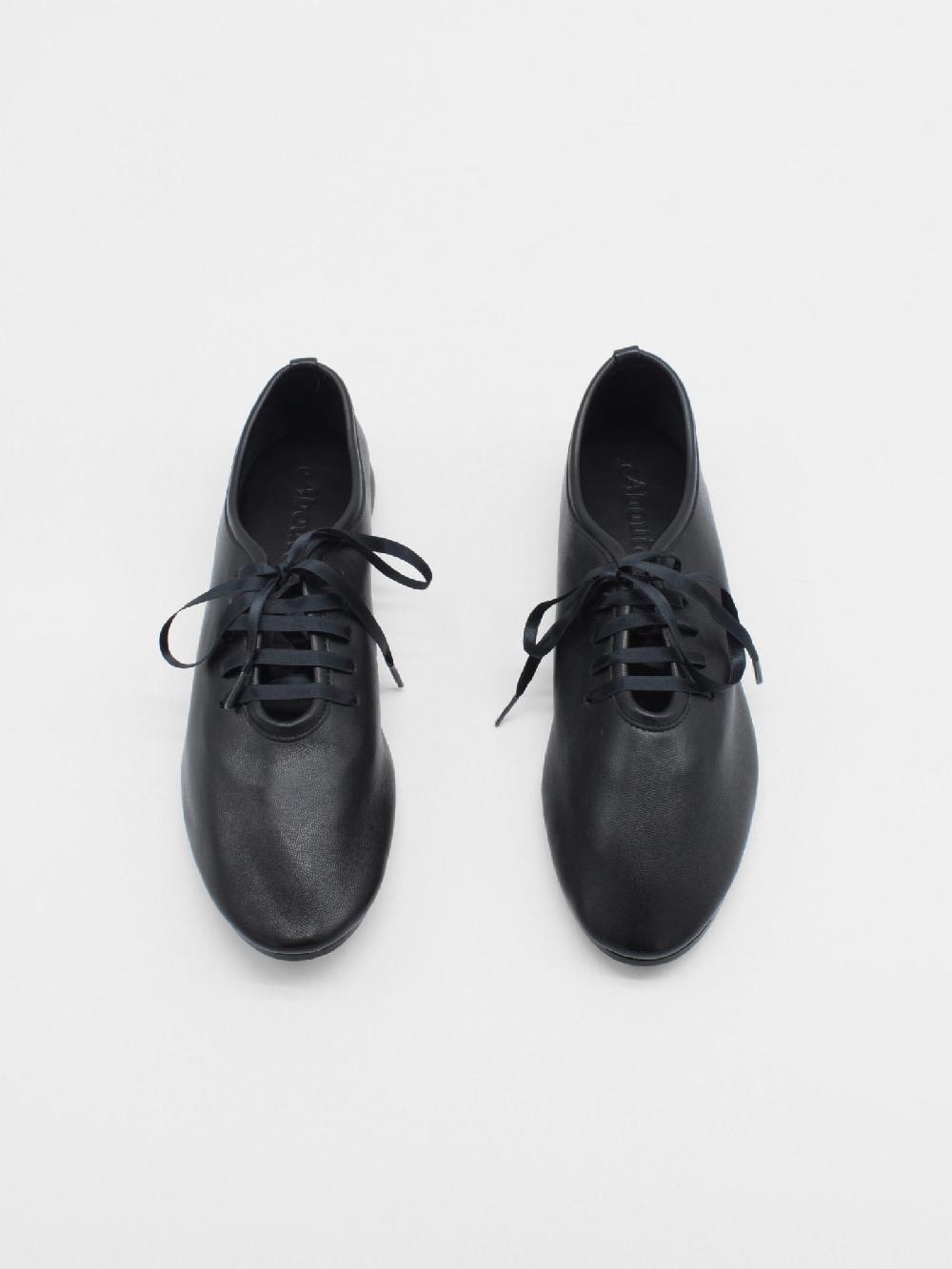 About Arianne Mateo Black Flats