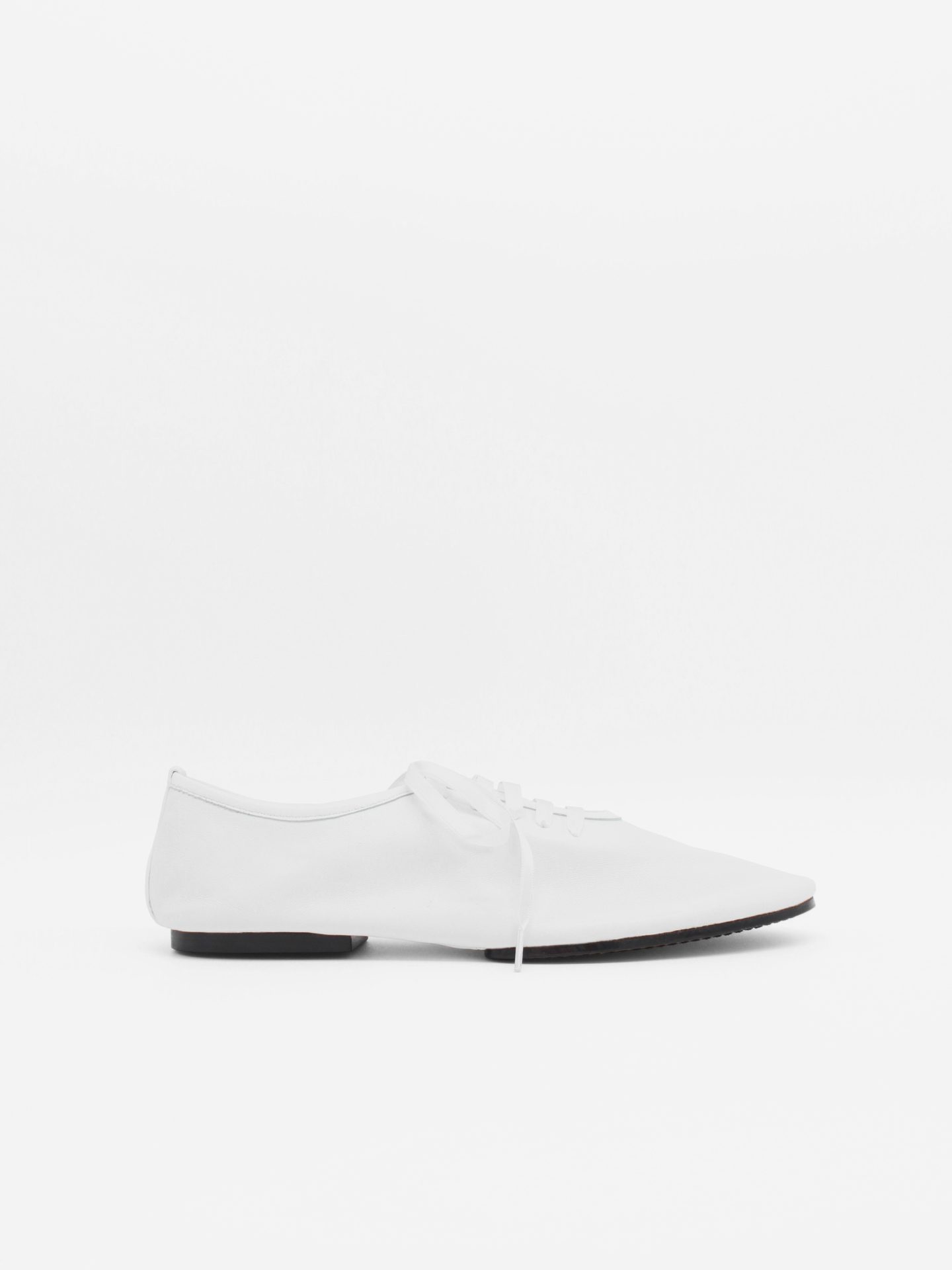 About Arianne Mateo White Flats