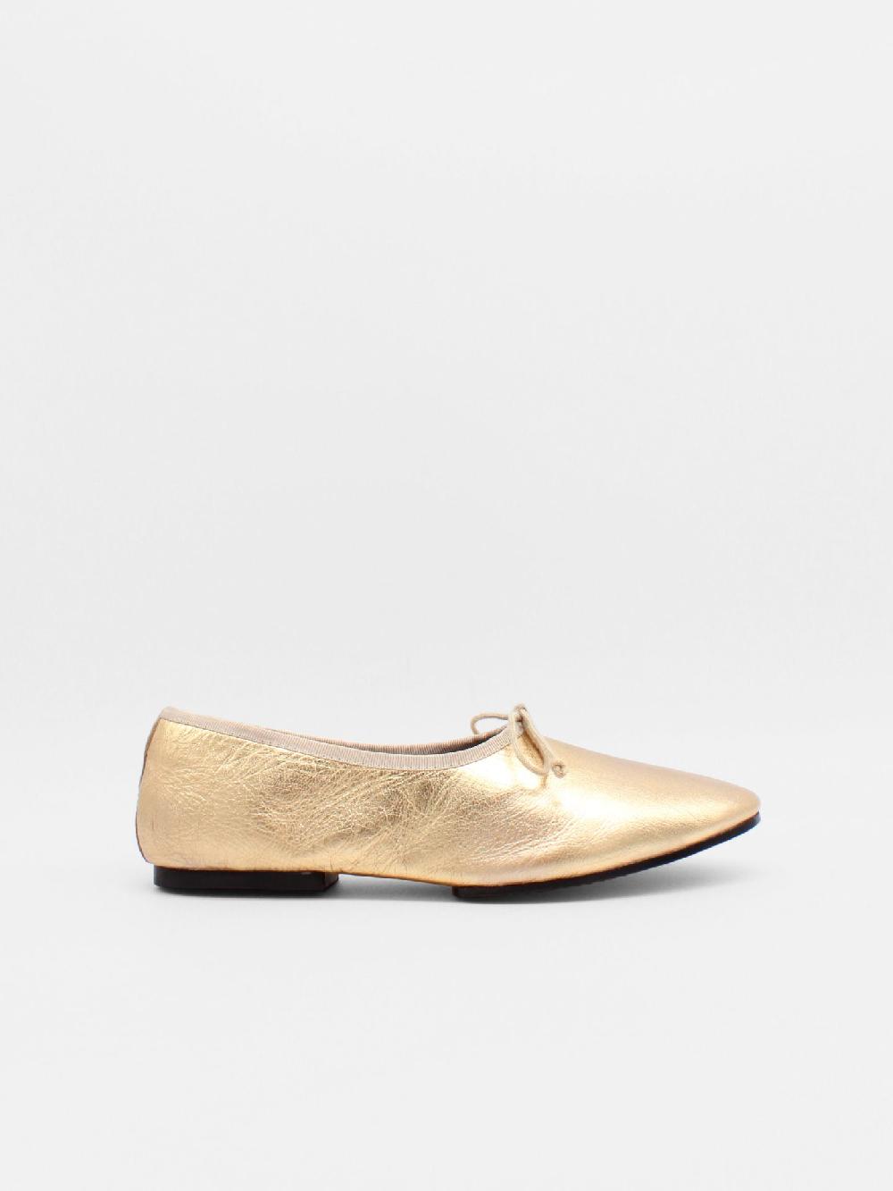 about arianne Mila Gold Flats