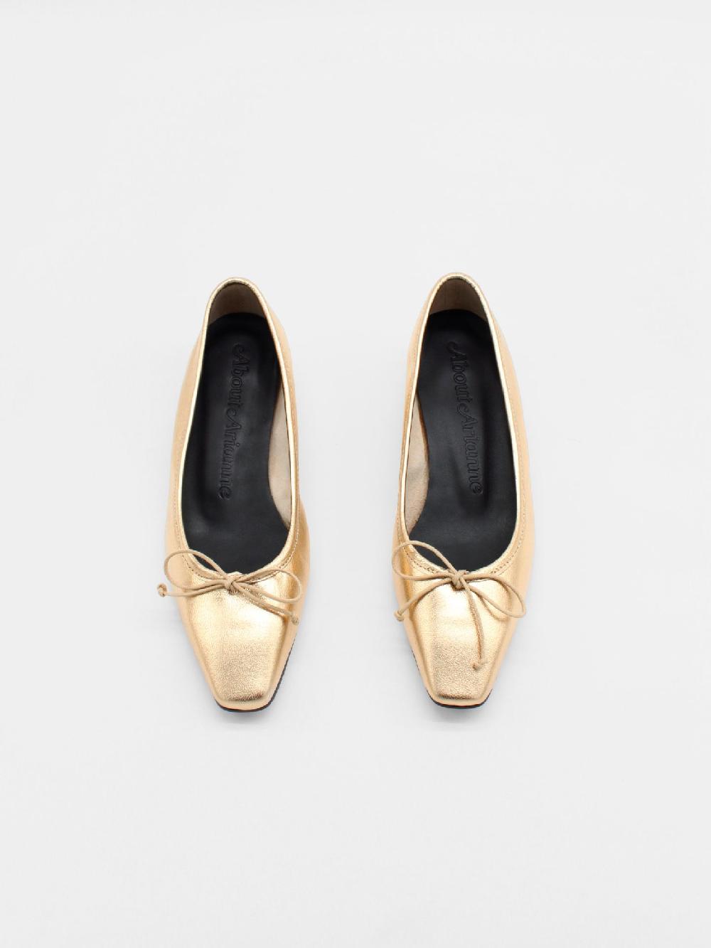 About Arianne Mina Gold Flats