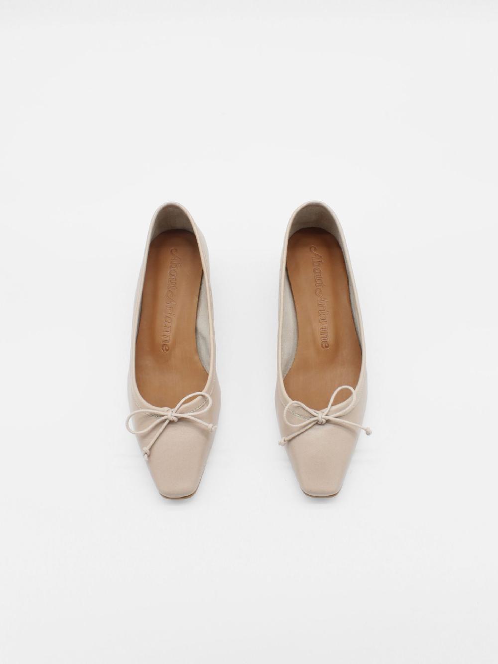 About Arianne Mina Tan Flats