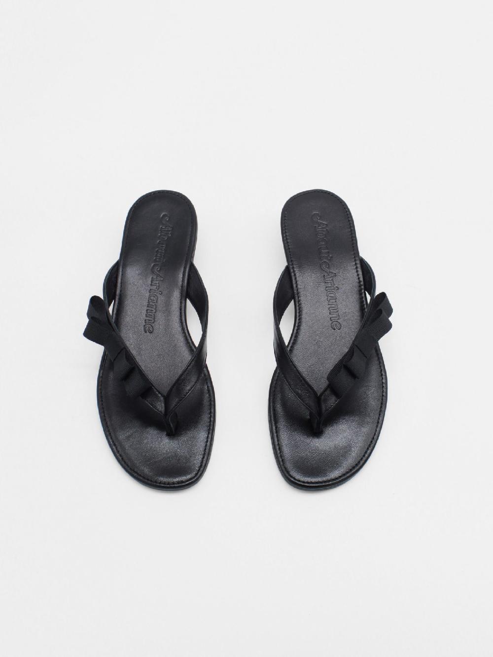 About Arianne René Black Sandals