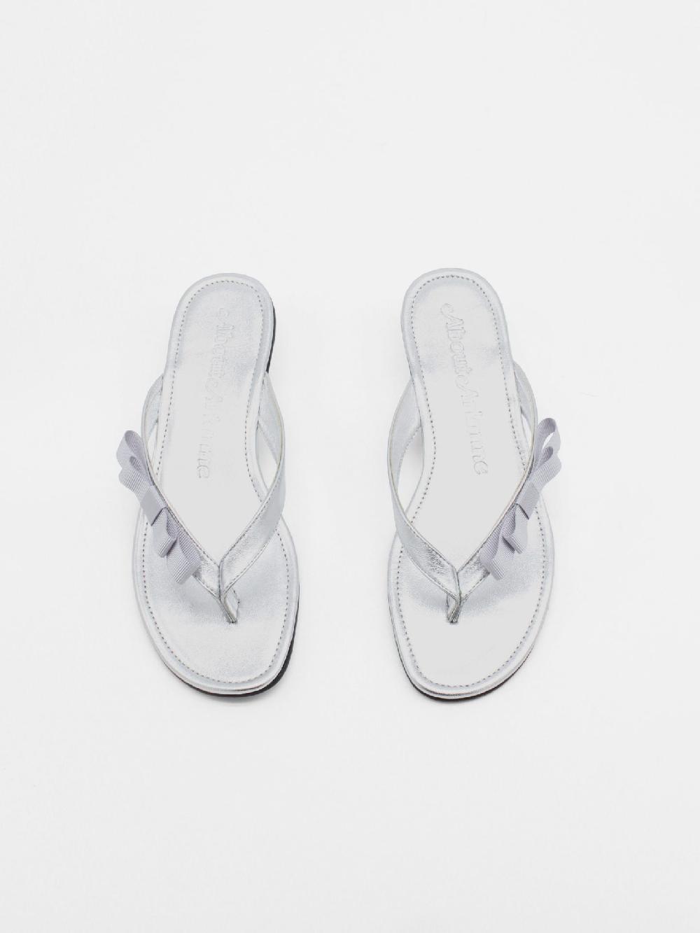 About Arianne René Scale Sandals