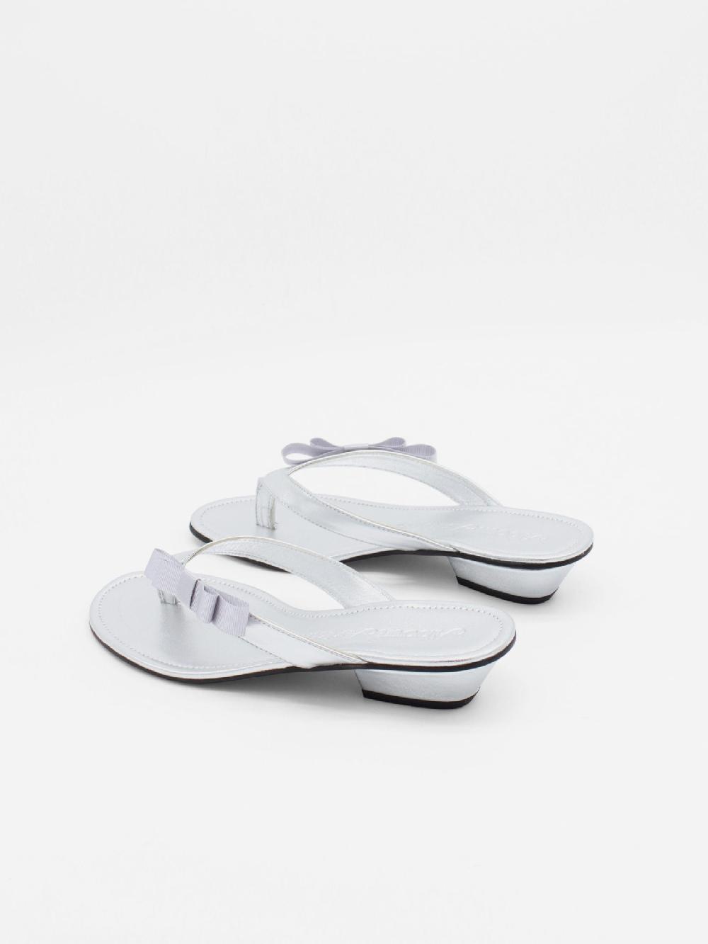 About Arianne René Scale Sandals