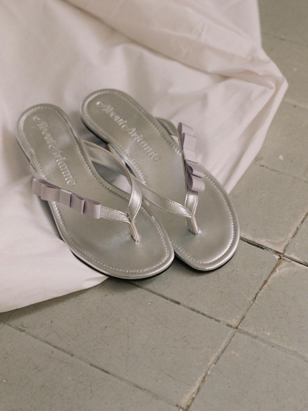 about arianne René Scale Sandals