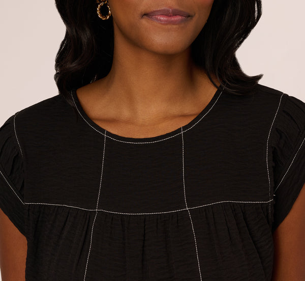 Adrianna Papell Extended Shoulder Contrast Stitch Yoke Top In Black Ivory