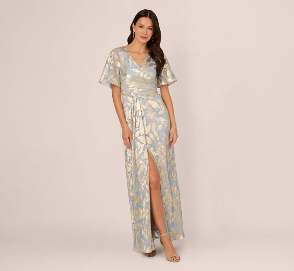 Adrianna Papell Foil Leaf Short Sleeve Gown With Draped Details In Light Blue Gold