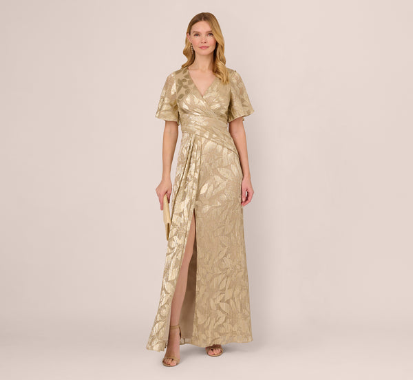 Adrianna Papell Foil Leaf Short Sleeve Gown With Draped Details In Champagne Gold