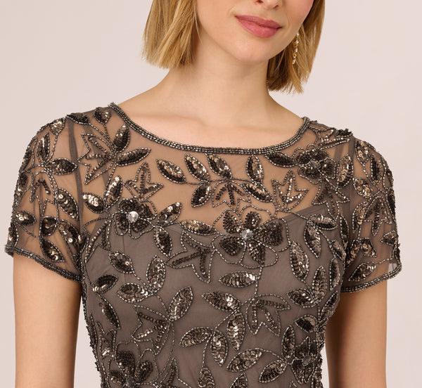 Adrianna Papell Hand Beaded Short Sleeve Floral Godet Gown In Lead