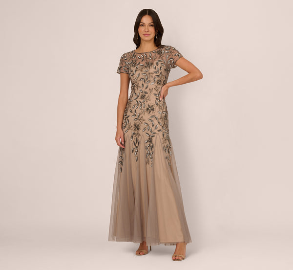 Adrianna Papell Hand Beaded Short Sleeve Floral Godet Gown In Mercury Nude