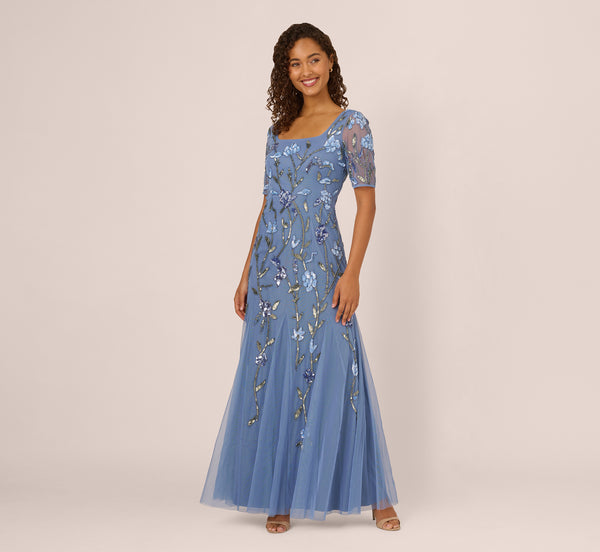 Adrianna Papell Square Neck Short Sleeve Beaded Godet Gown In French Blue