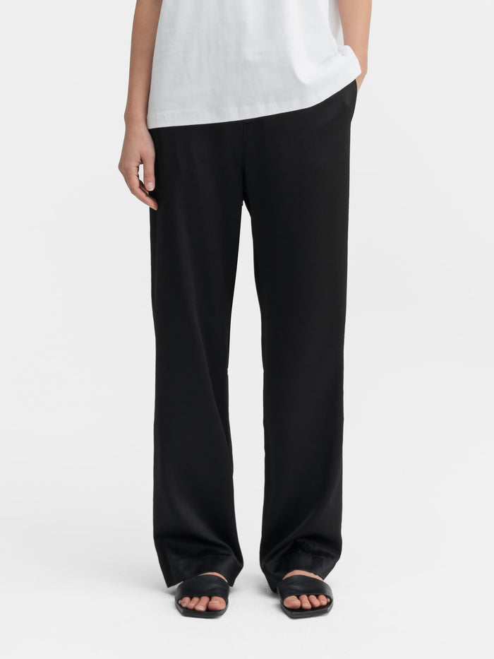 ahlvar Ava satin silk trousers black