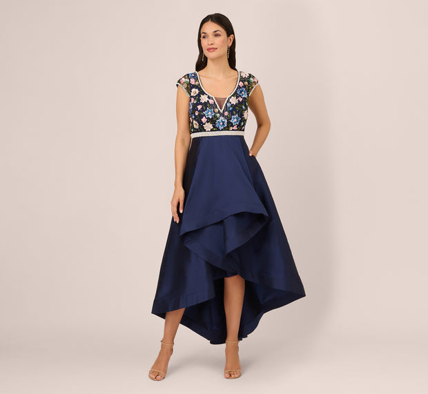 Aidan Mattox Cap Sleeve Beaded Gown With Taffeta High Low Skirt In Light Navy