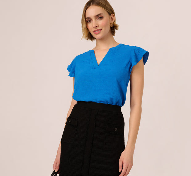 Aidan Mattox Flutter Sleeve Top With Notched Neck In Egyptian Blue
