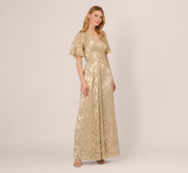 Aidan Mattox Foil Leaf Short Sleeve Gown With Draped Details In Champagne Gold