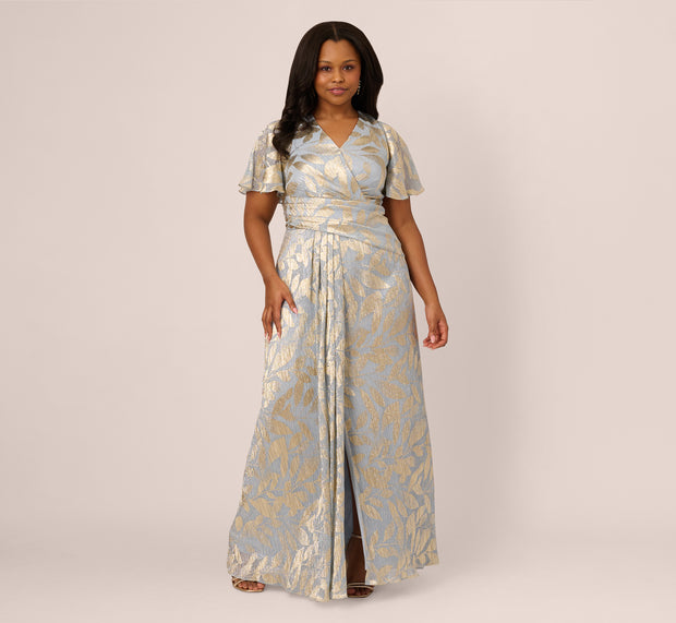 Aidan Mattox Plus Size Foil Leaf Short Sleeve Gown With Draped Details In Light Blu