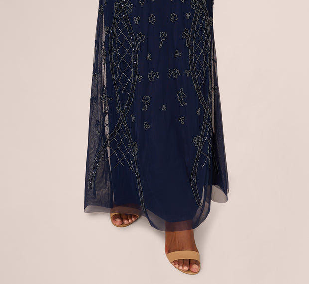 Aidan Mattox Sequin Beaded Gown With Sheer Cape Sleeves In Light Navy