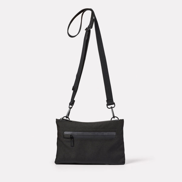 ally capellino Herb Travel Cycle Crossbody Bag in Black