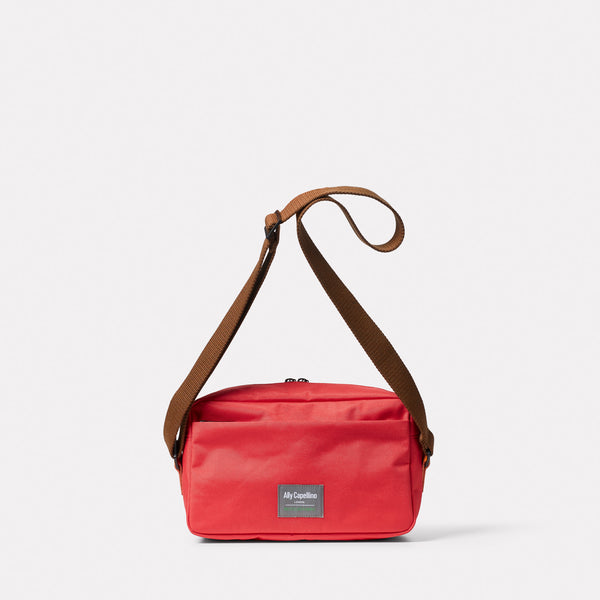 Ally Capellino Hotspur Travel Cycle Recycled Crossbody Bag In Crimson