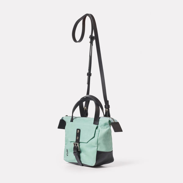 Ally Capellino Squat Waxed Cotton Crossbody Mini Bag In Aqua