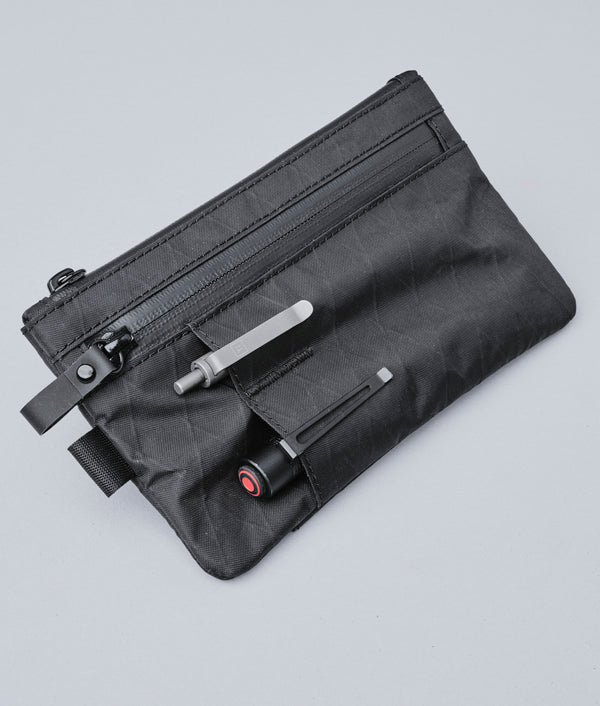 Alpaka Zip Clutch