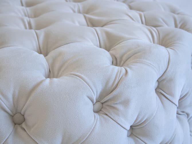 Andrew Martin Buttoned Velvet Ottoman In Putty