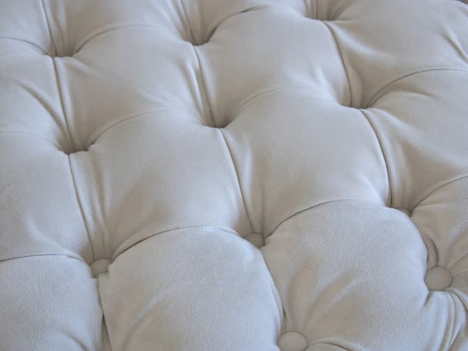 Andrew Martin Buttoned Velvet Ottoman In Putty