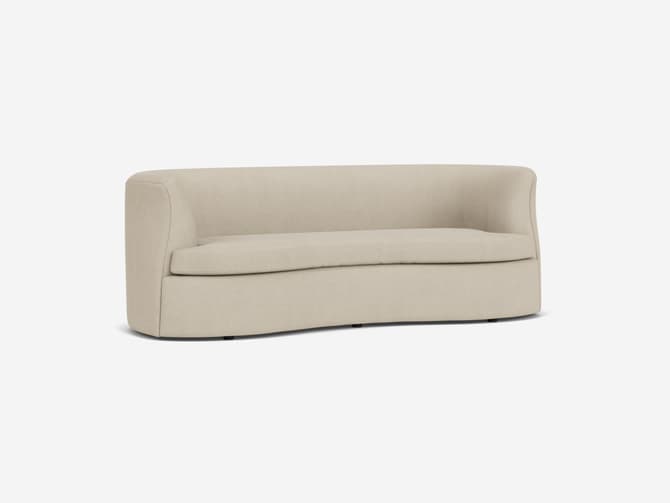 andrew martin Elegant curved sofa in any fabric