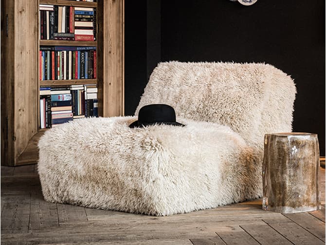 Andrew Martin Luxurious Sheepskin Motion Chair By Timothy Oulton