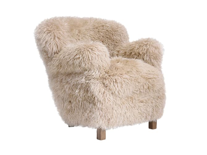 andrew martin Luxury sheepskin arm chair by Timothy Oulton