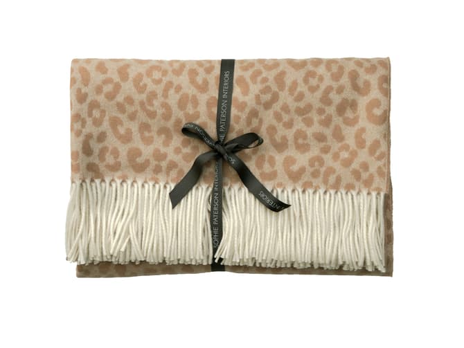 andrew martin Merino wool animal print throw in tan