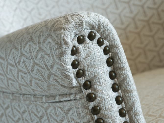 Andrew Martin Small Armchair Upholstered In A Neutral Geometric Fabric