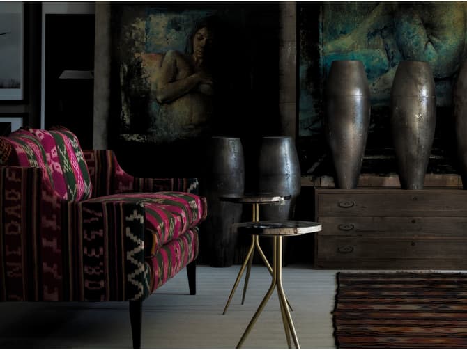 andrew martin Small round petrified wood side table