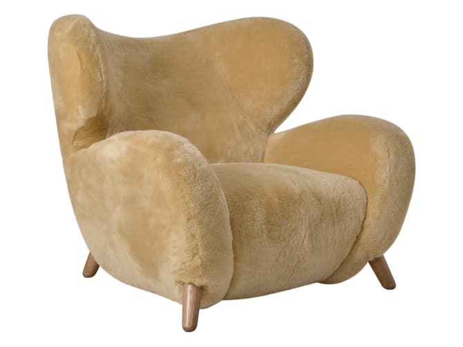 andrew martin Soft sheepskin armchair by Timothy Oulton