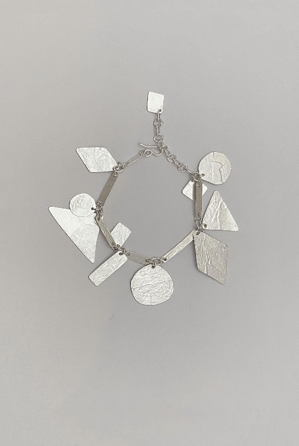 Annie Costello Brown Pyramid Charms Bracelet Silver