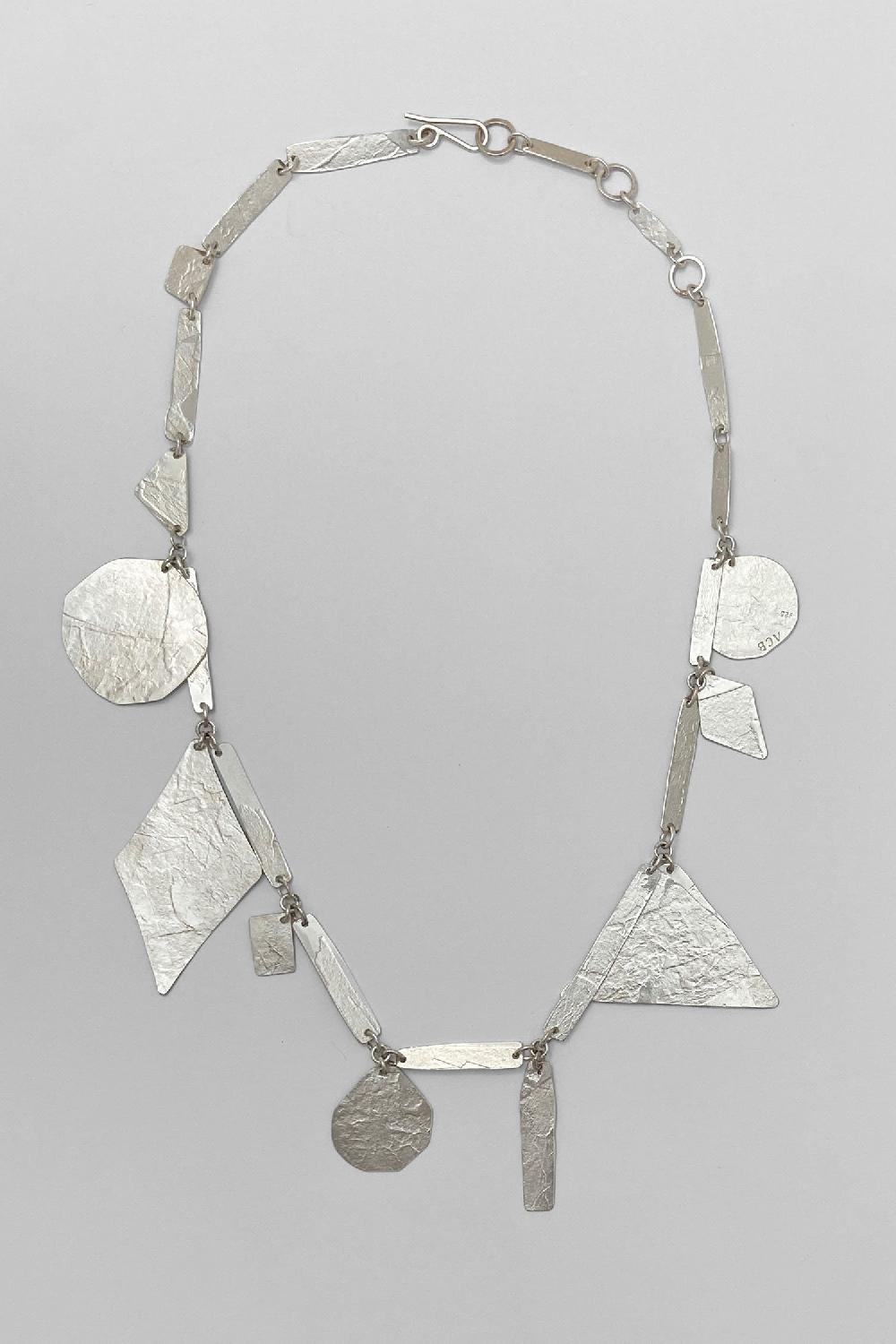 Annie Costello Brown Pyramid Charms Necklace Silver