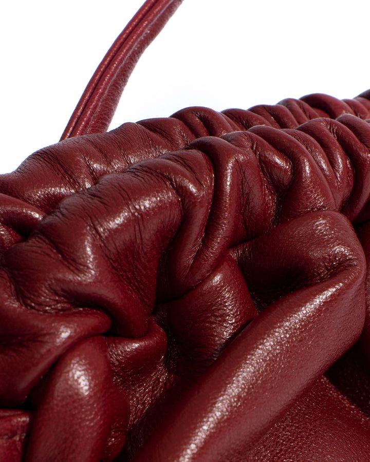 Anonymous Copenhagen Hally Petite Cloud Bag Shiny Lamb Pomegranate