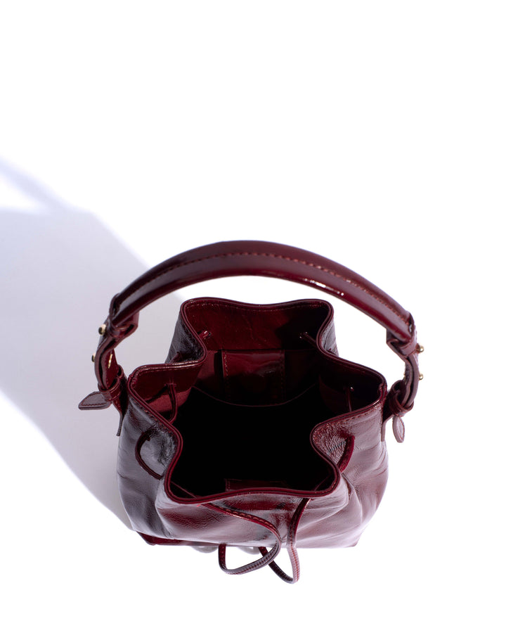 Anonymous Copenhagen Kacey Petite Bucket Bag Crinkled Polished Goat Pomegranate